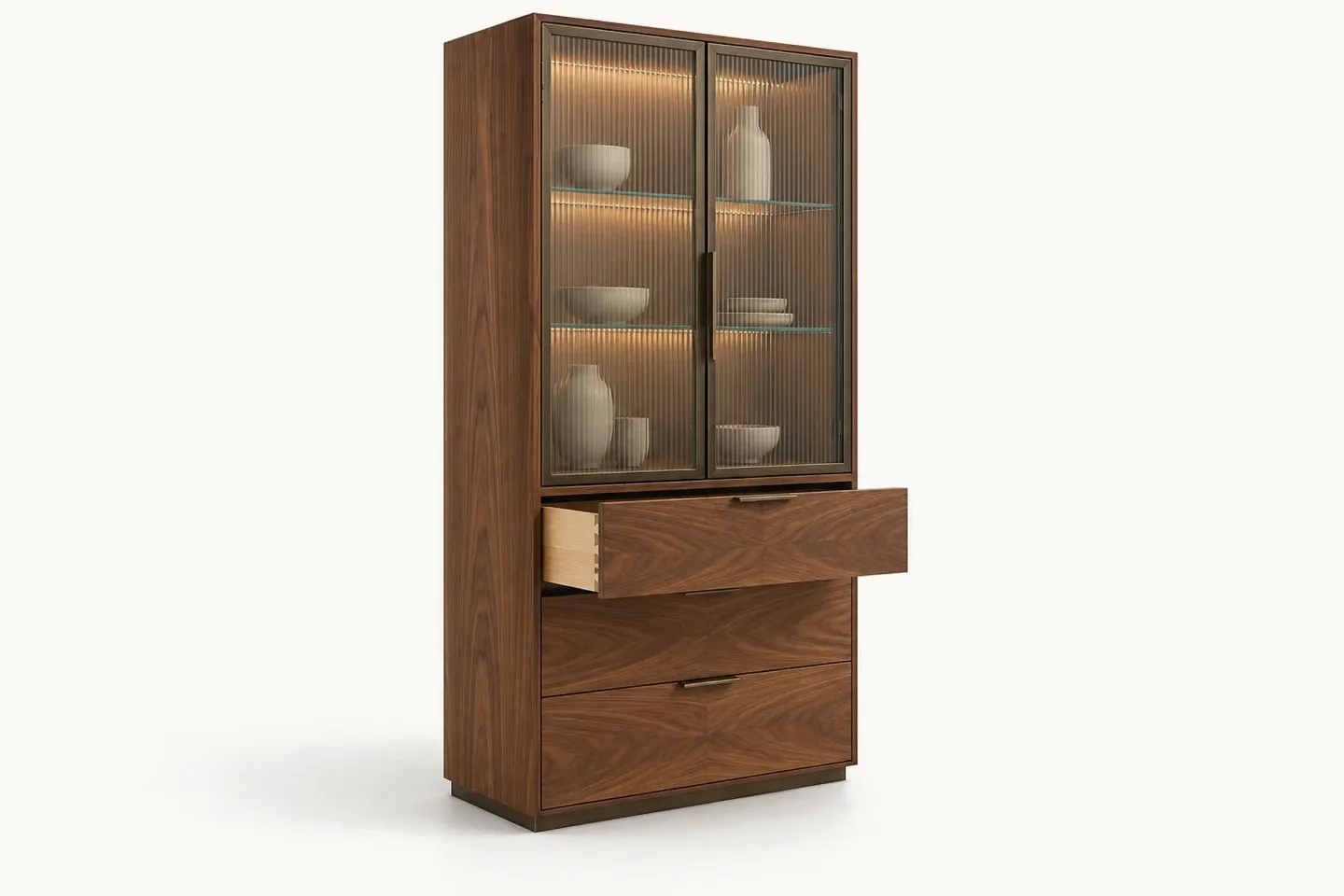 Tall walnut cabinet with reeded glass doors and its top drawer pulled open